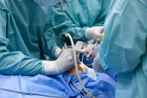Operating room with team performing sinus surgery